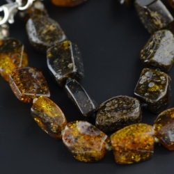 Green amber bracelet with silver